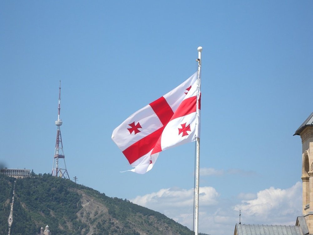 СМИ: представители ЮО сняли флаг Грузии у 